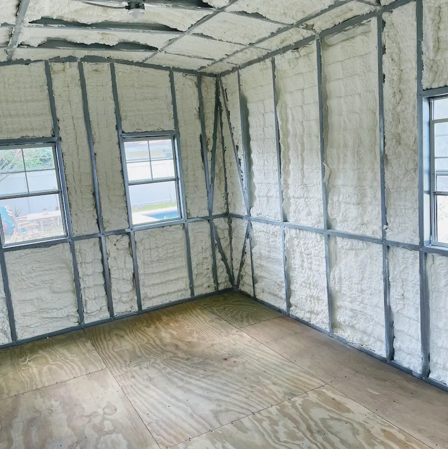 Closed-cell spray foam insulation applied to wall cavities in a residential project in Altoona